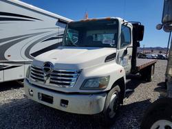 Salvage trucks for sale at North Las Vegas, NV auction: 2007 Hino 268 Flatbed Truck