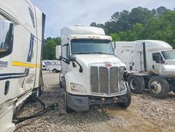 Salvage cars for sale from Copart Florence, MS: 2018 Peterbilt 579 Semi Truck