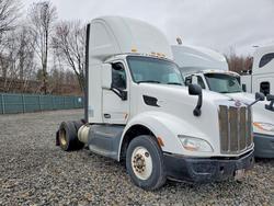 Salvage cars for sale from Copart Duryea, PA: 2016 Peterbilt 579 Semi Truck