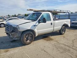 Salvage cars for sale from Copart Bakersfield, CA: 2003 Ford F250 Super Duty