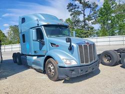 Salvage trucks for sale at Loganville, GA auction: 2021 Peterbilt 579 Semi Truck