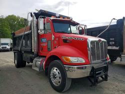 Salvage trucks for sale at Waldorf, MD auction: 2009 Peterbilt 335 Dump Truck