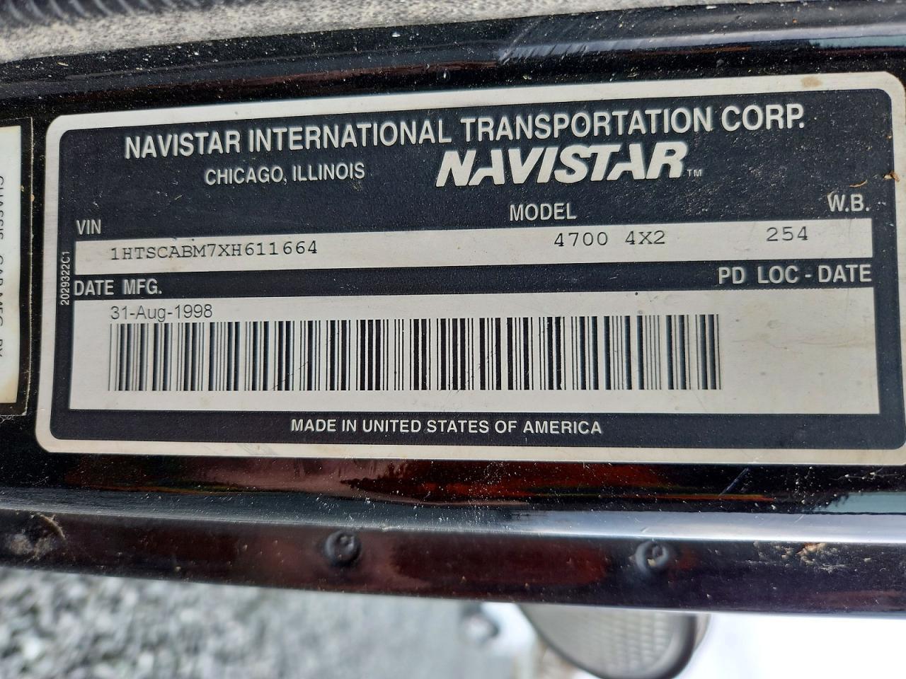 1999 International 4700 Spreader Truck