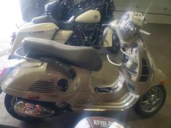 Salvage motorcycles for sale at Denver, CO auction: 2023 Vespa GTS/SEI Giorni 300