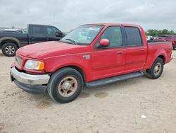 Salvage trucks for sale at Houston, TX auction: 2001 Ford F150 Supercrew