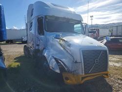 Salvage trucks for sale at Farr West, UT auction: 2022 Volv O VNL Semi Truck