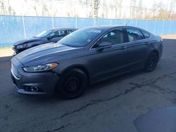 Salvage cars for sale from Copart Moncton, NB: 2014 Ford Fusion Titanium
