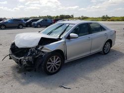 Salvage cars for sale from Copart West Palm Beach, FL: 2013 Toyota Camry Hybrid