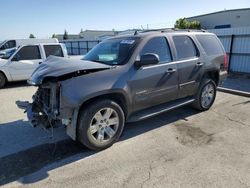 Salvage cars for sale from Copart Bakersfield, CA: 2010 GMC Yukon SLT