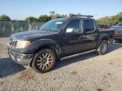Salvage cars for sale from Copart Riverview, FL: 2010 Nissan Frontier Crew Cab SE