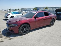 Salvage cars for sale from Copart Bakersfield, CA: 2018 Dodge Charger SXT Plus