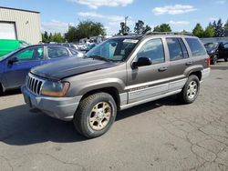 Salvage cars for sale from Copart Woodburn, OR: 2000 Jeep Grand Cherokee Laredo