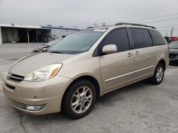 Salvage cars for sale from Copart Sun Valley, CA: 2004 Toyota Sienna XLE