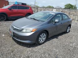 Salvage cars for sale from Copart Homestead, FL: 2012 Honda Civic LX