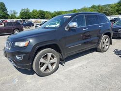 Jeep Grand Cherokee Overland salvage cars for sale: 2014 Jeep Grand Cherokee Overland