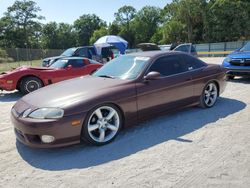 Salvage cars for sale from Copart Fort Pierce, FL: 1997 Lexus SC 400