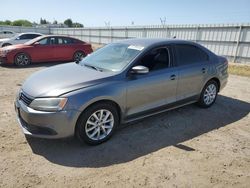 Salvage cars for sale from Copart Bakersfield, CA: 2011 Volkswagen Jetta SE
