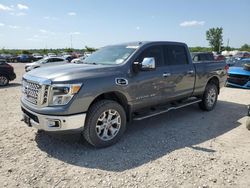 Salvage cars for sale from Copart Kansas City, KS: 2016 Nissan Titan XD SL