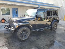 Salvage cars for sale from Copart Fort Pierce, FL: 2015 Jeep Wrangler Unlimited Sahara