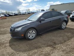 Salvage cars for sale from Copart Rocky View County, AB: 2015 Chevrolet Cruze LT