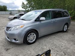 Salvage cars for sale from Copart Arlington, WA: 2011 Toyota Sienna XLE