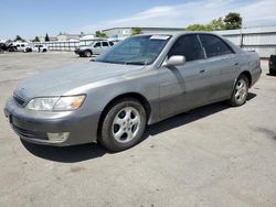 Salvage cars for sale from Copart Bakersfield, CA: 1999 Lexus ES 300
