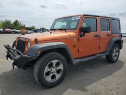 Jeep salvage cars for sale: 2011 Jeep Wrangler Unlimited Sport