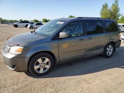 Salvage cars for sale from Copart London, ON: 2009 Dodge Grand Caravan SE