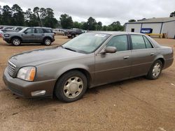 Salvage cars for sale from Copart Longview, TX: 2000 Cadillac Deville