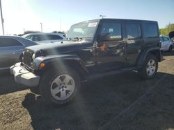 Jeep Wrangler salvage cars for sale: 2011 Jeep Wrangler Unlimited Sahara