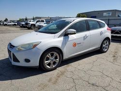 Salvage cars for sale from Copart Bakersfield, CA: 2013 Ford Focus SE
