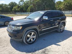 Salvage cars for sale from Copart Fort Pierce, FL: 2011 Jeep Grand Cherokee Overland
