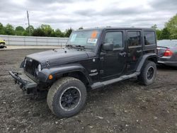 Salvage cars for sale from Copart Windsor, NJ: 2011 Jeep Wrangler Unlimited Sahara
