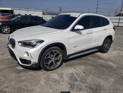 Salvage cars for sale from Copart Sun Valley, CA: 2016 BMW X1 XDRIVE28I