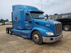 Salvage trucks for sale at Midway, FL auction: 2015 Peterbilt 579 Semi Truck