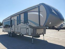 Salvage trucks for sale at Eldridge, IA auction: 2014 Wildwood 2014 Foresriver 5th Wheel