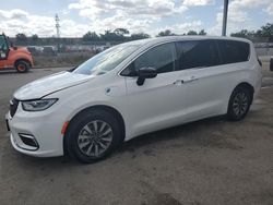 Salvage cars for sale from Copart Orlando, FL: 2024 Chrysler Pacifica Hybrid Select