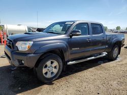 Salvage trucks for sale at Rocky View County, AB auction: 2014 Toyota Tacoma Double Cab Long BED