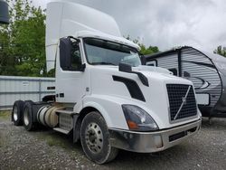 Salvage trucks for sale at Leroy, NY auction: 2014 Volvo VNL Semi Truck
