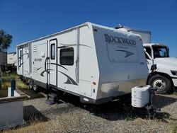 Salvage trucks for sale at Anderson, CA auction: 2013 Wildwood 2013 Foresriver Rockwood