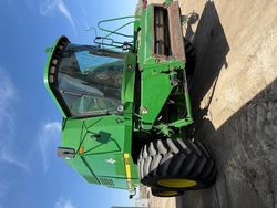 Salvage trucks for sale at Rocky View County, AB auction: 1997 John Deere COM