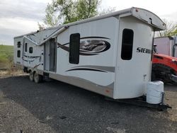 Salvage trucks for sale at Marlboro, NY auction: 2013 Wildwood 2013 Foresriver Sierra