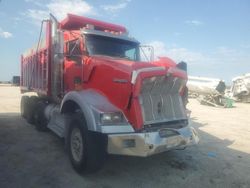 Salvage trucks for sale at Miami, FL auction: 2009 Kenworth Construction T800