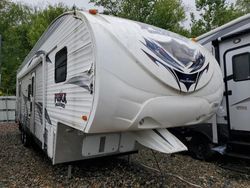 Salvage trucks for sale at West Warren, MA auction: 2012 Wildwood 2012 Foresriver Puma