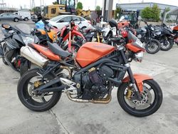 Salvage motorcycles for sale at Wilmington, CA auction: 2010 Triumph Street Triple R