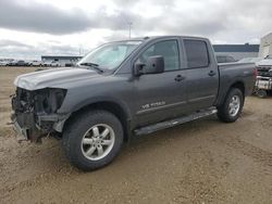 Salvage trucks for sale at Nisku, AB auction: 2010 Nissan Titan XE
