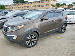 Salvage cars for sale from Copart Opa Locka, FL: 2011 KIA Sportage ex