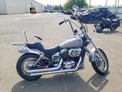 Salvage motorcycles for sale at Woodburn, OR auction: 2003 Honda VT750 DCB