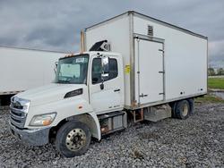 Salvage trucks for sale at Angola, NY auction: 2014 Hino 258/268 BOX Truck