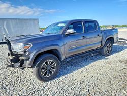 Salvage trucks for sale at Arcadia, FL auction: 2021 Toyota Tacoma TRD Sport